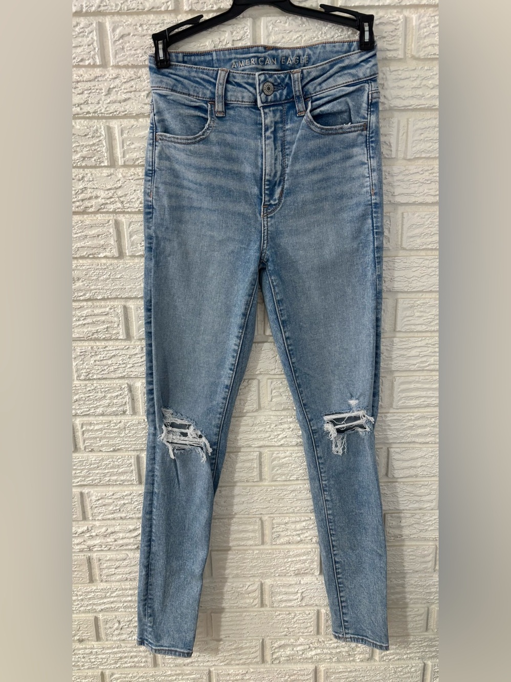 American Eagle Next Level Stretch Super Hi Rise Jegging Light Wash Size 2
